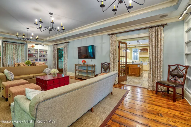 a bedroom with a bed and a view of bedroom