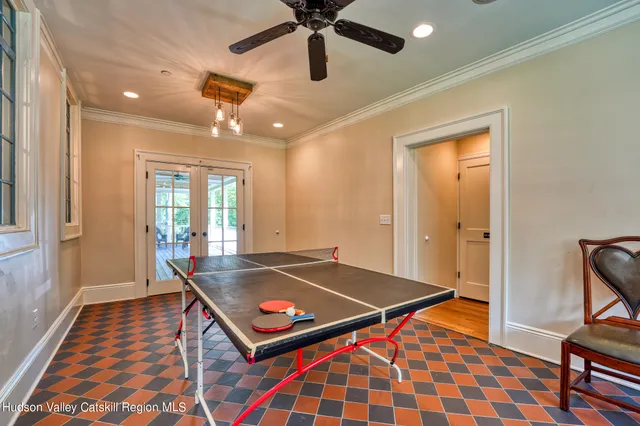 a bedroom with a bed and a table