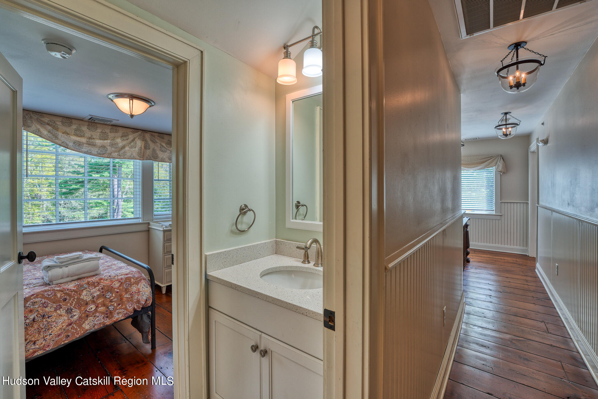 103 Carney Road Ulster Park, NY 12487 - Photo 47 of 89 a bathroom with a granite countertop sink a toilet and shower