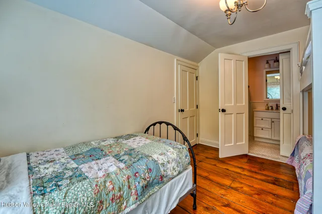 a kitchen with stainless steel appliances granite countertop a refrigerator sink and stove