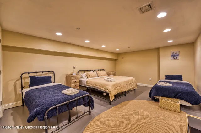 a view of a chairs in backyard of house