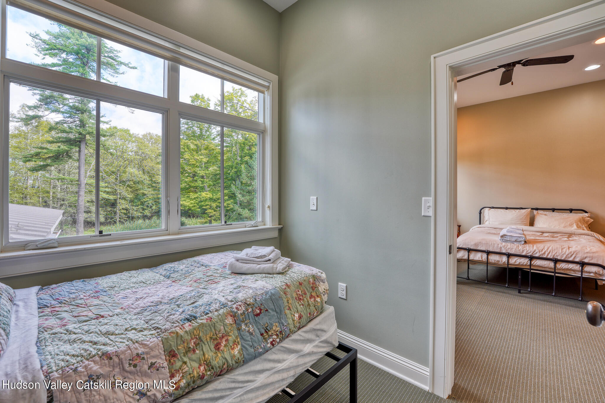 103 Carney Road Ulster Park, NY 12487 - Photo 54 of 89 a bedroom with a bed and wooden floor