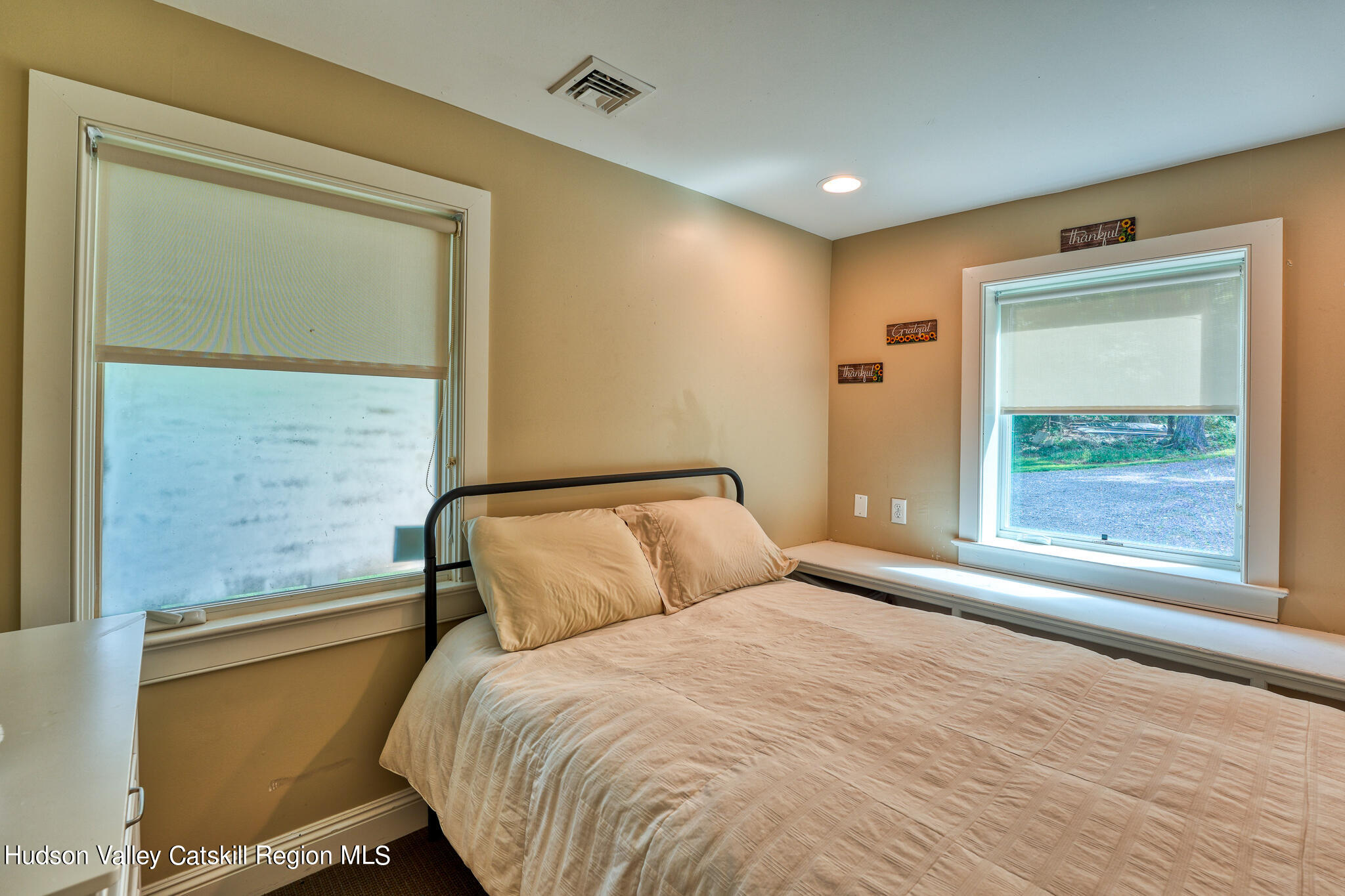 103 Carney Road Ulster Park, NY 12487 - Photo 60 of 89 a bedroom with a bed and a window