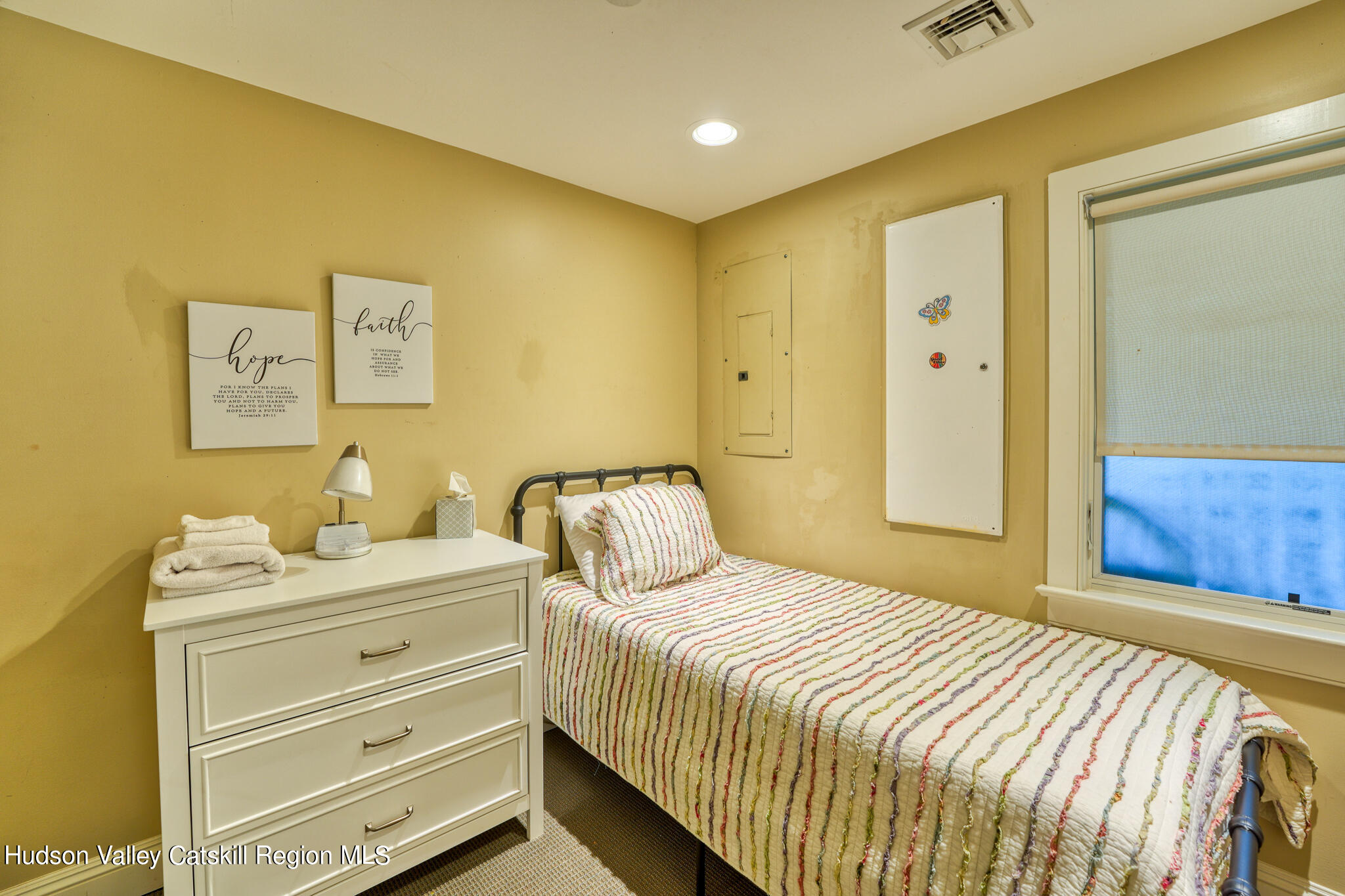 103 Carney Road Ulster Park, NY 12487 - Photo 61 of 89 a bedroom with a bed and a dresser