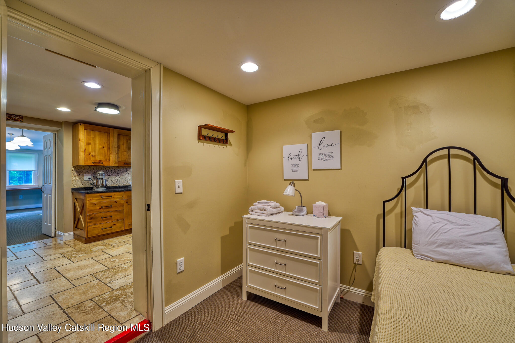 103 Carney Road Ulster Park, NY 12487 - Photo 66 of 89 a bedroom with a bed and a mirror