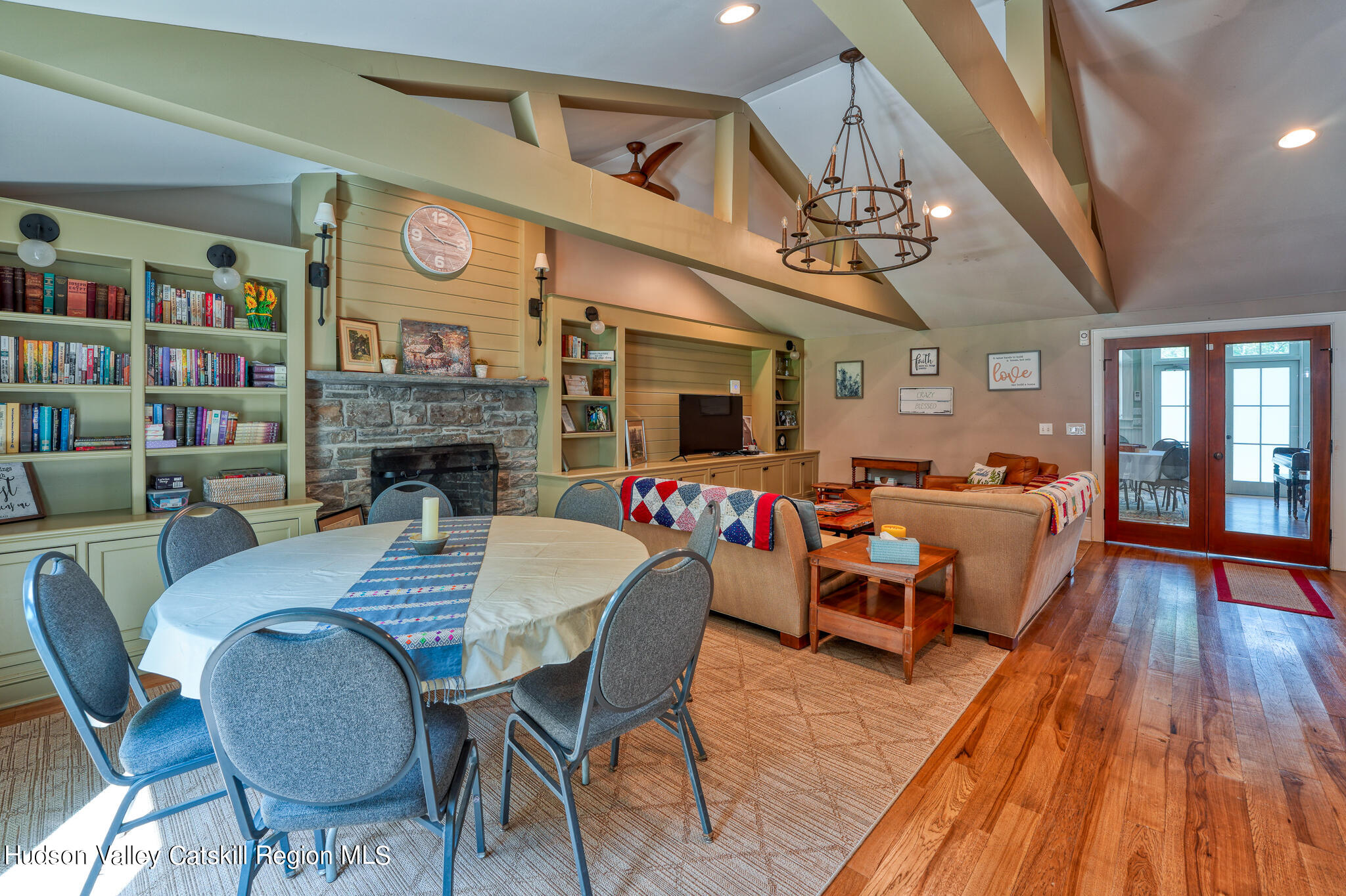 103 Carney Road Ulster Park, NY 12487 - Photo 74 of 89 a living room with fireplace furniture and a wooden floor