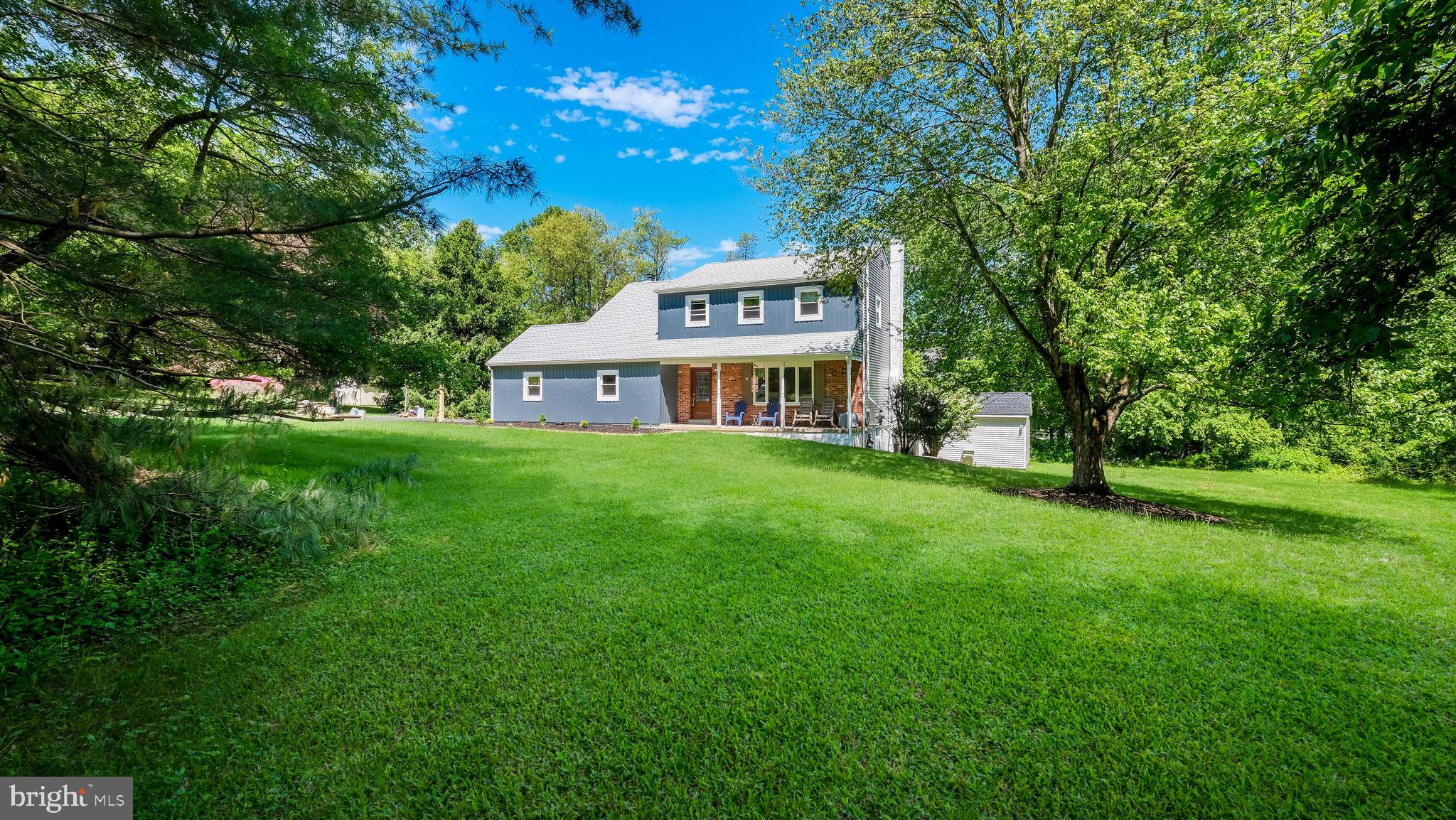 1270 Oxford Valley Road Yardley, PA 19067 - Photo 1 of 39 a view of a house with a big yard