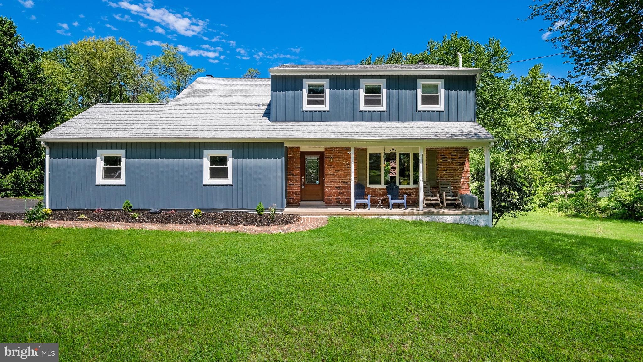 1270 Oxford Valley Road Yardley, PA 19067 - Photo 2 of 39 a front view of a house with a garden
