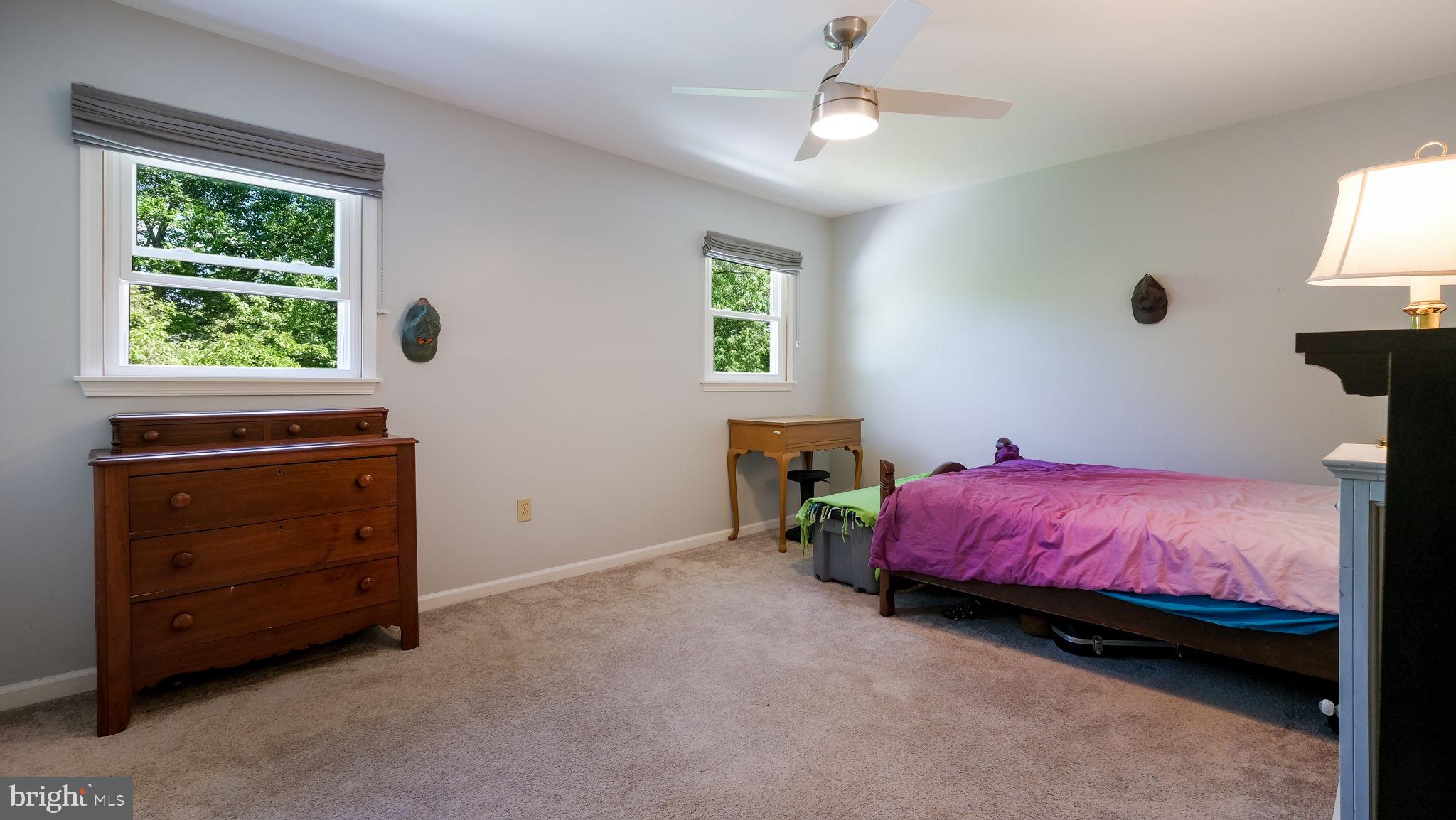 1270 Oxford Valley Road Yardley, PA 19067 - Photo 29 of 39 a bedroom with a bed and a window