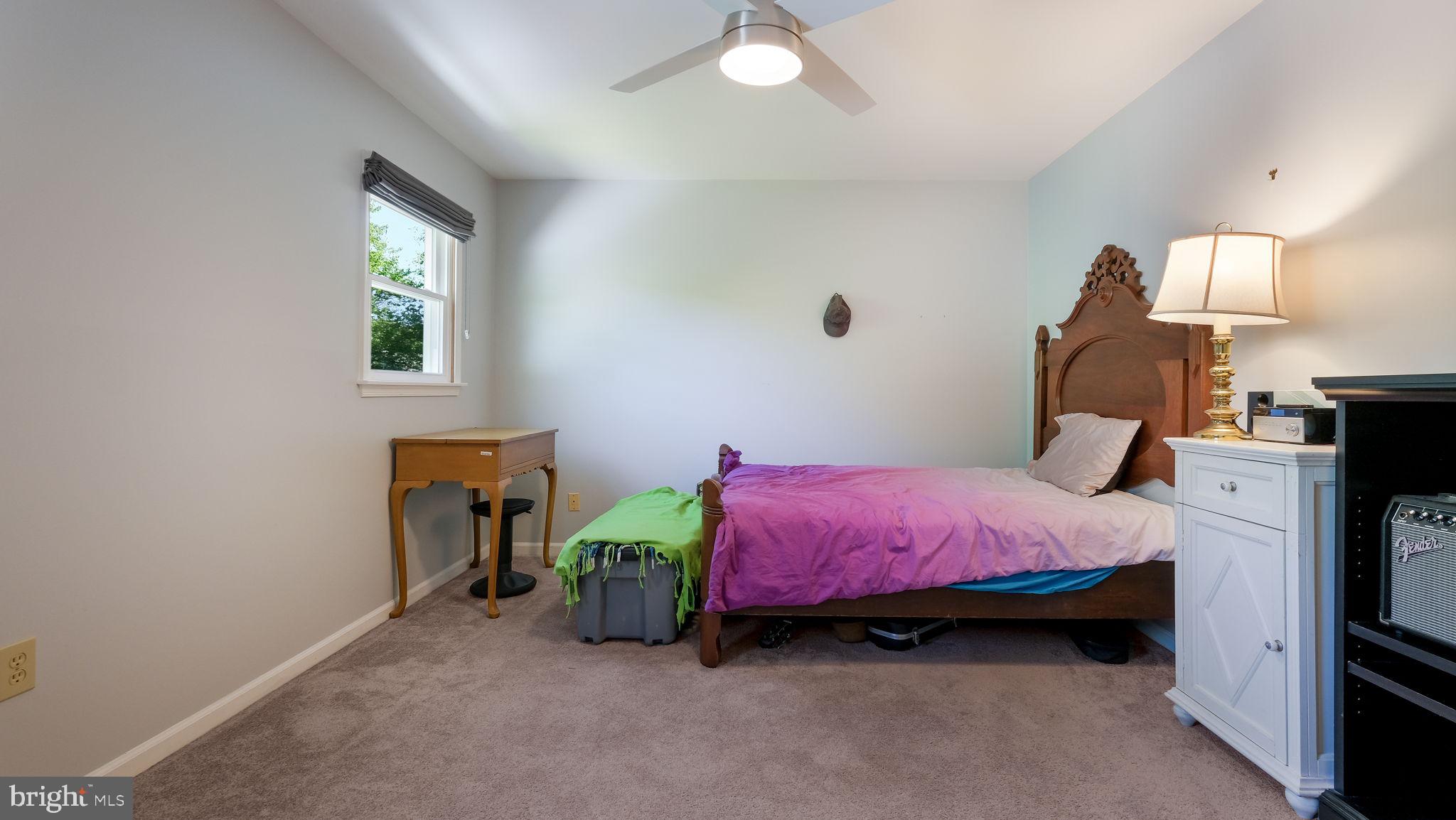1270 Oxford Valley Road Yardley, PA 19067 - Photo 30 of 39 a bedroom with a bed and a window