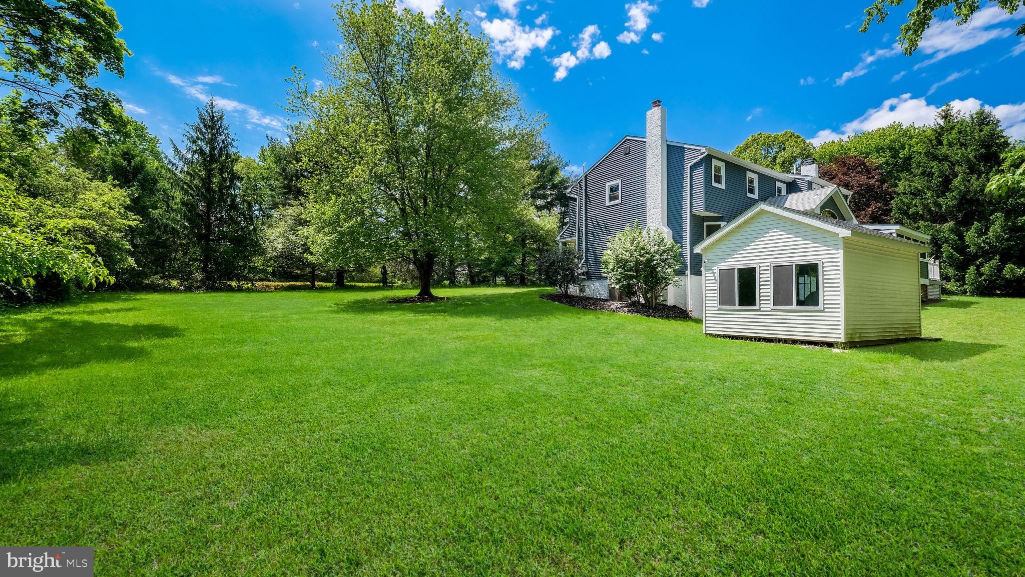 1270 Oxford Valley Road Yardley, PA 19067 - Photo 36 of 39 a front view of a house with a garden