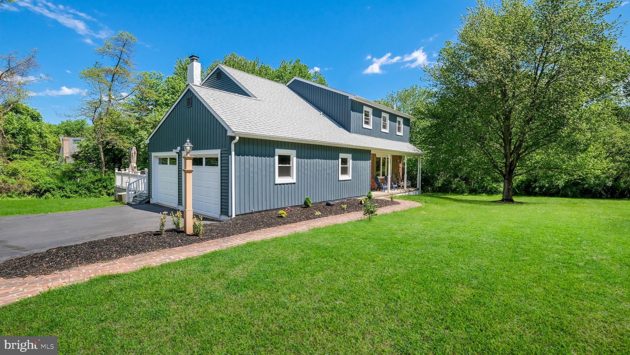 1270 Oxford Valley Road Yardley, PA 19067 - Photo 38 of 39 a view of a house with a yard and sitting area