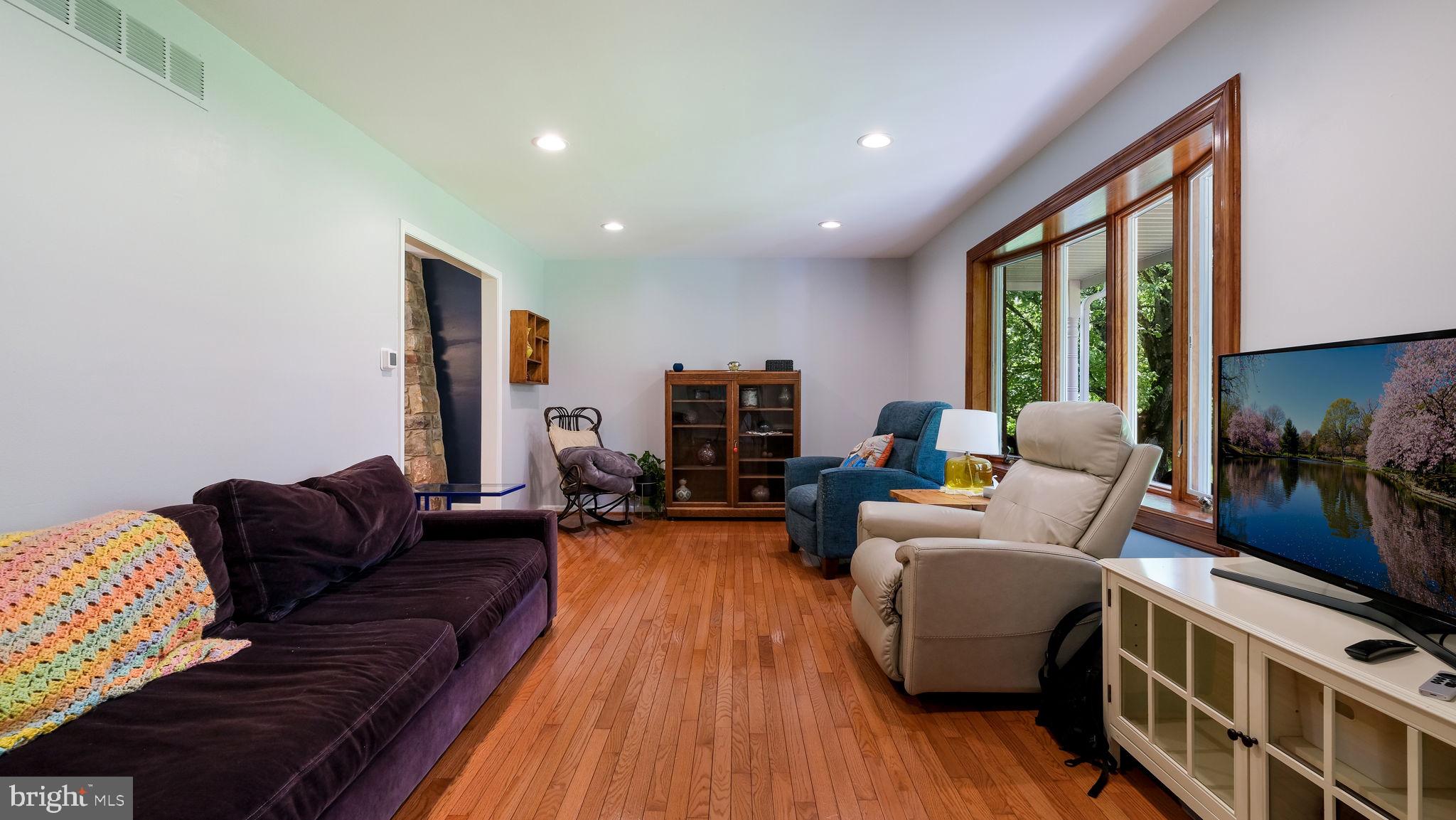 1270 Oxford Valley Road Yardley, PA 19067 - Photo 6 of 39 a living room with furniture and a large window