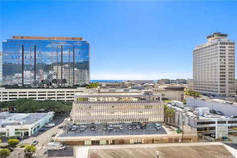 a large building with a view of the ocean