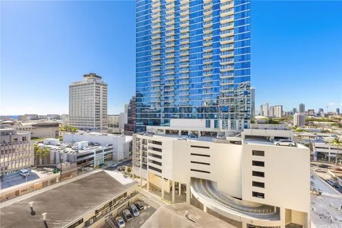 a view of roof with city view