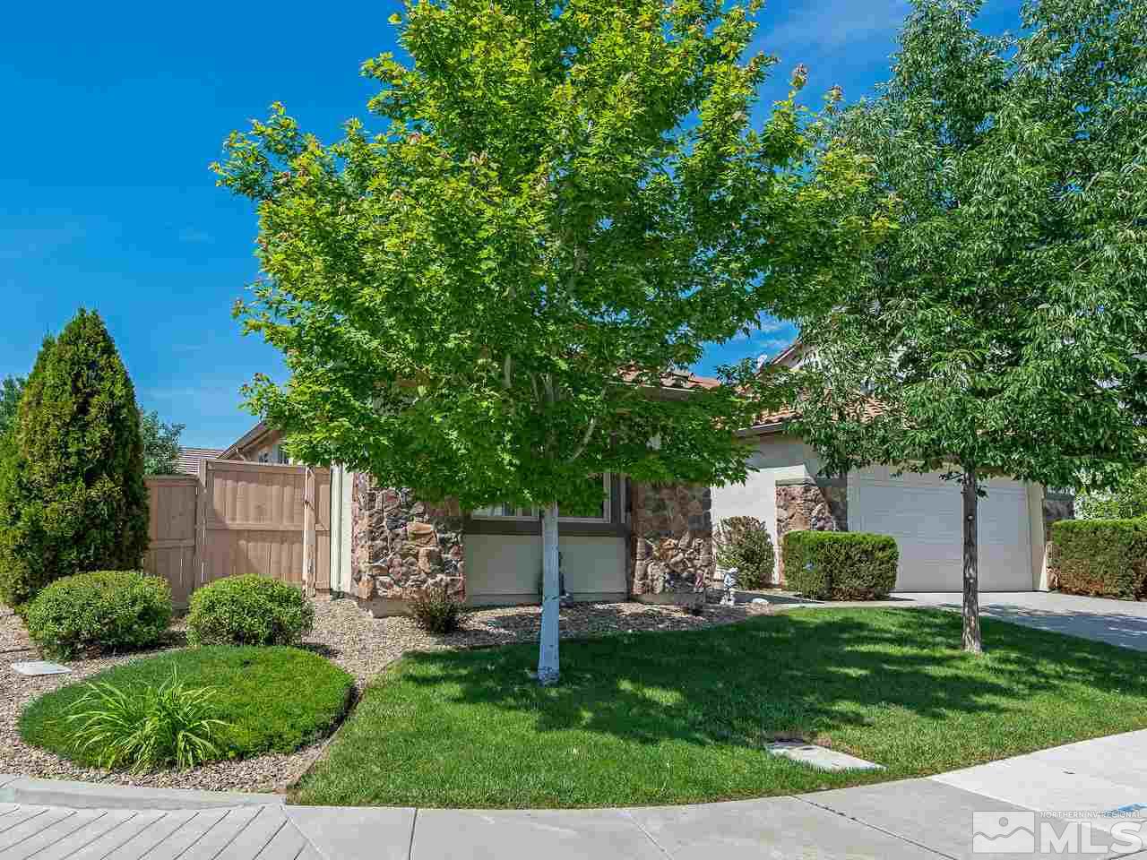 2598 Spring Flower Drive Reno, NV 89521 - Photo 2 of 21 front view of a house with a yard