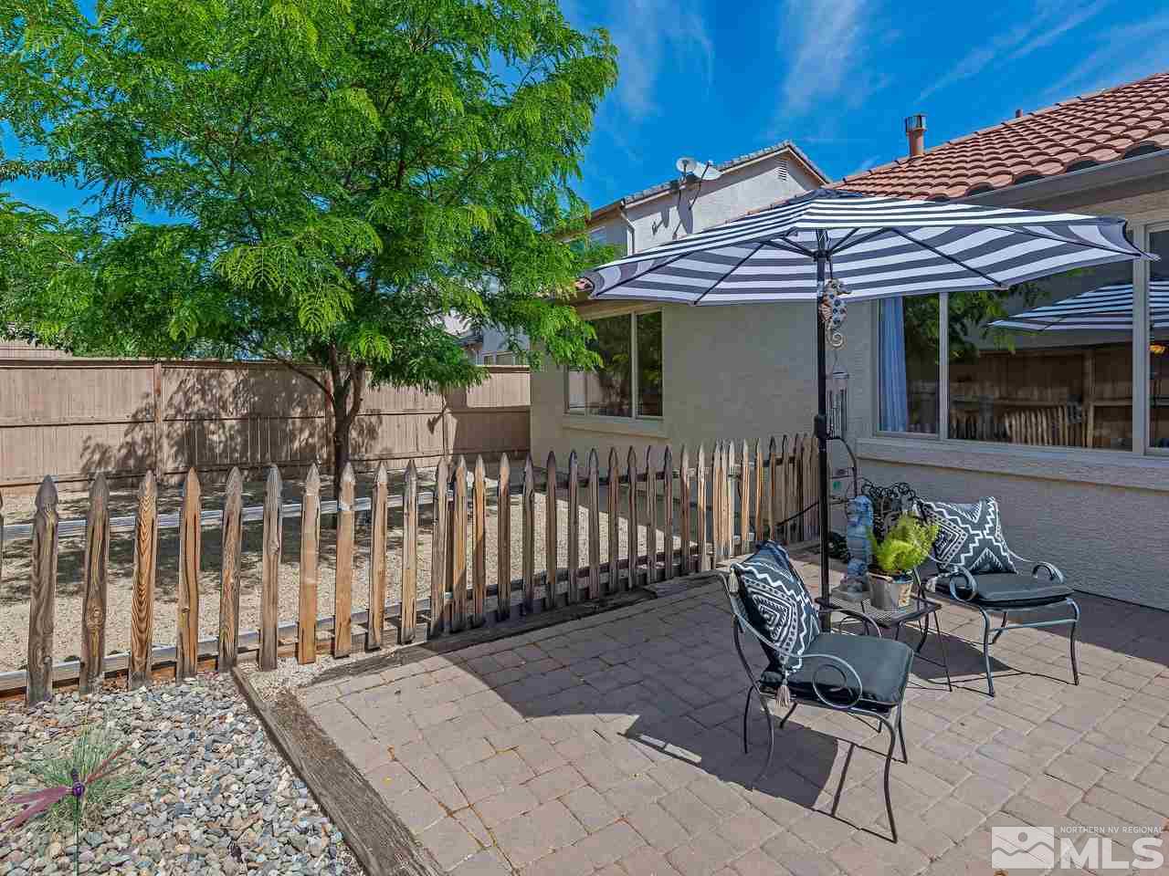 2598 Spring Flower Drive Reno, NV 89521 - Photo 21 of 21 a balcony with table and chairs