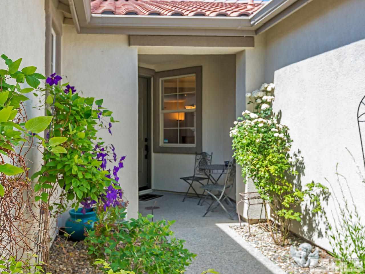 2598 Spring Flower Drive Reno, NV 89521 - Photo 3 of 21 a front view of a house with a yard