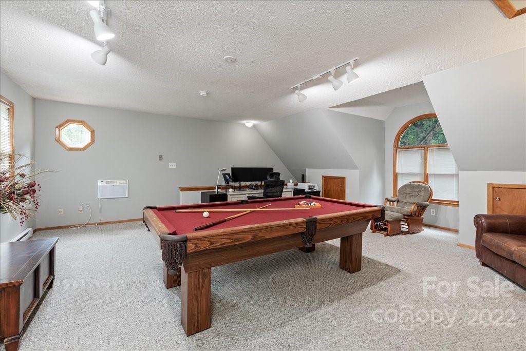 709 Neill Ridge Road Matthews, NC 28105 - Photo 26 of 38 a room with furniture pool table and windows