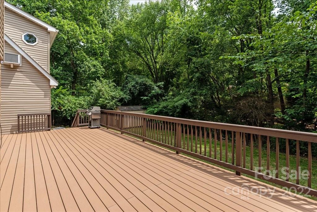 709 Neill Ridge Road Matthews, NC 28105 - Photo 28 of 38 a view of balcony with wooden floor and fence