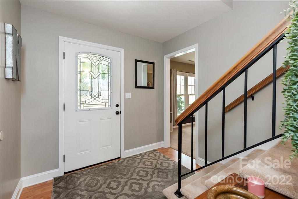 709 Neill Ridge Road Matthews, NC 28105 - Photo 6 of 38 a view of an entryway with wooden floor
