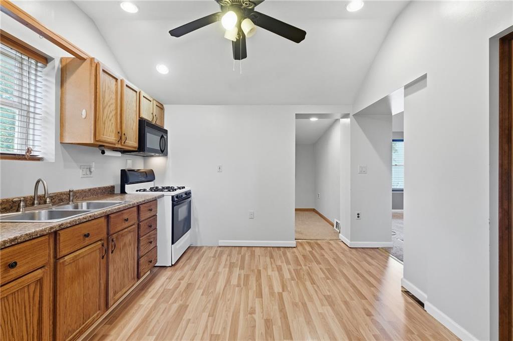 284 West Allegheny Road Imperial, PA 15126 - Photo 11 of 18 a kitchen with a sink window and cabinets