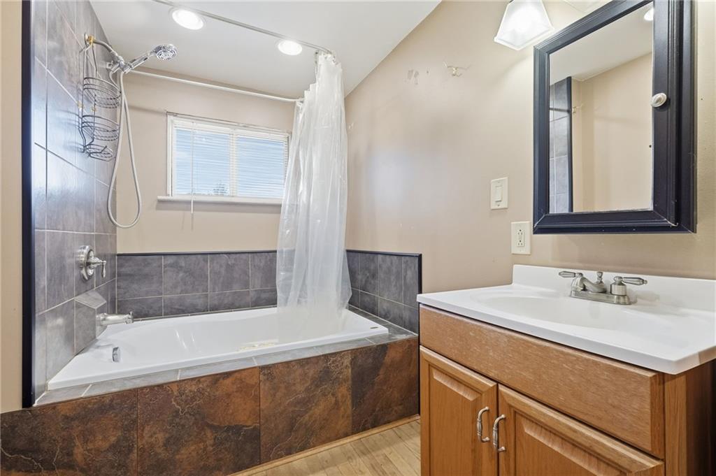 284 West Allegheny Road Imperial, PA 15126 - Photo 14 of 18 a bathroom with a bathtub and a sink