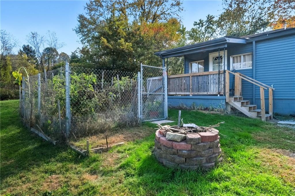 284 West Allegheny Road Imperial, PA 15126 - Photo 18 of 18 a view of a backyard with table and chairs potted plants and large tree