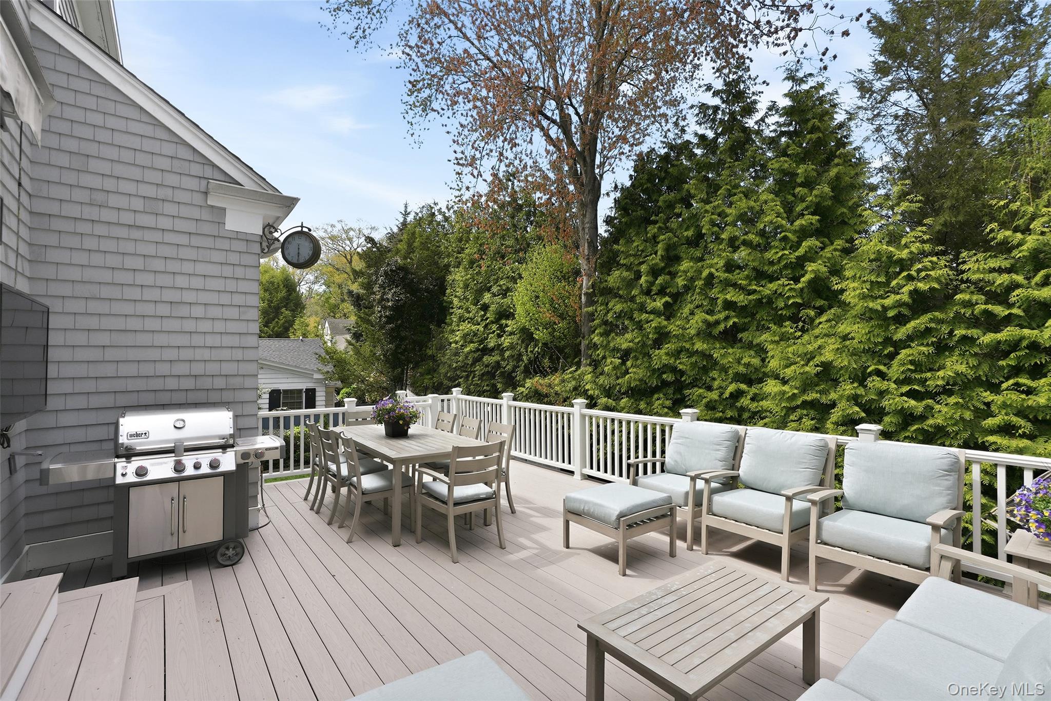 19 Onondaga Street Rye, NY 10580 - Photo 31 of 39 Trex deck off the family Room is perfect spot for game days with natural gas connection for gas grill and outdoor TV