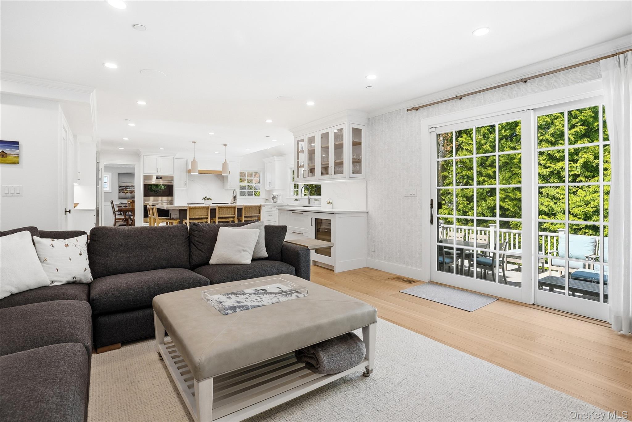19 Onondaga Street Rye, NY 10580 - Photo 10 of 39 The Family Room/Kitchen has sliding glass doors that open to the large 445' Trex deck for seamless indoor/outdoor entertaining