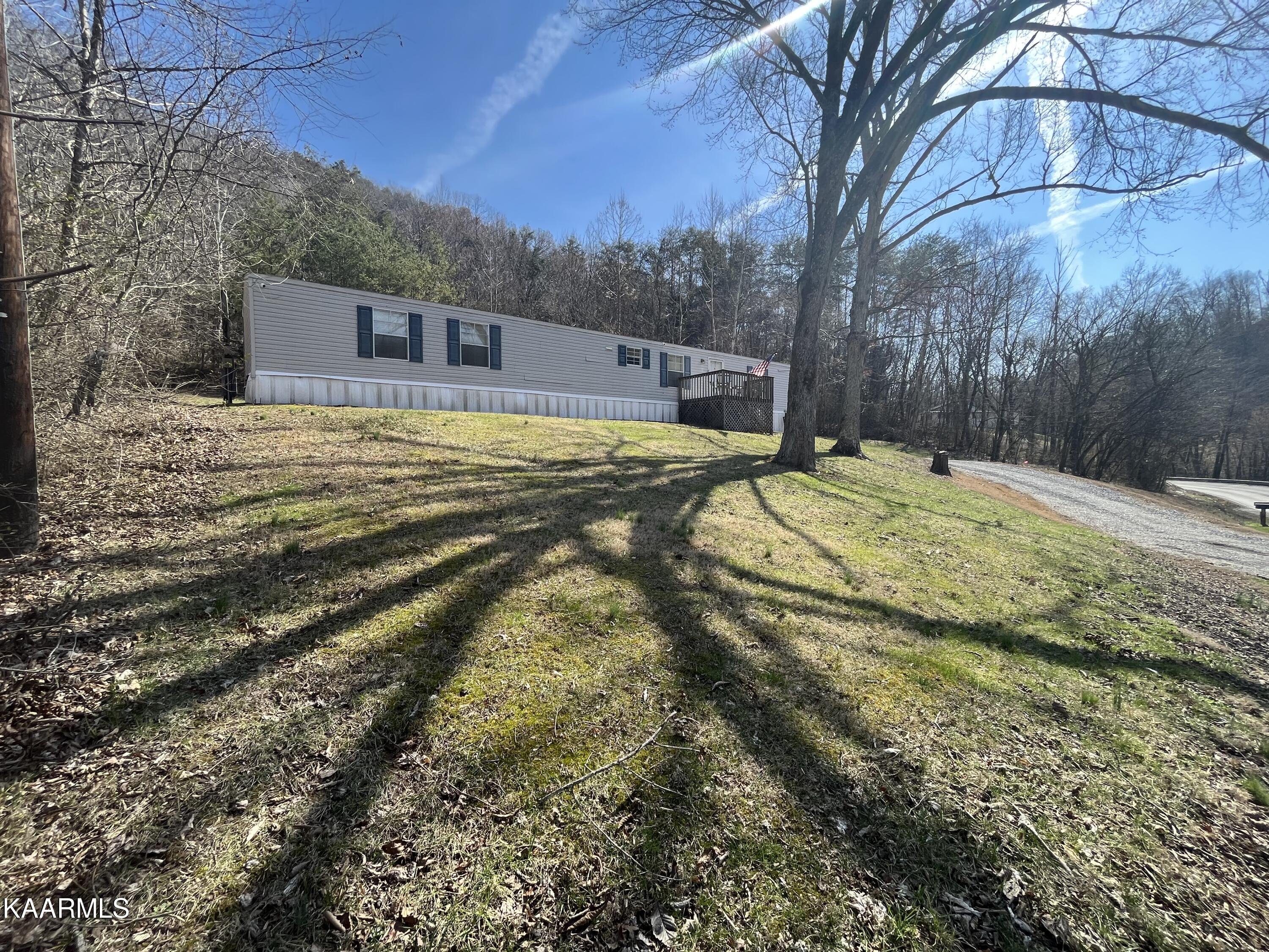 3918 Roberts Road Corryton, TN 37721 - Photo 4 of 7 Left side of property - driveway view
