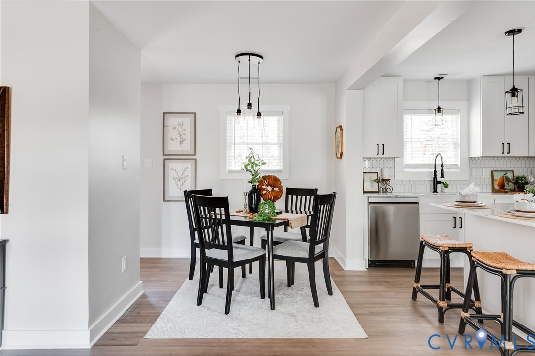 10298 Jamestown Road Ashland, VA 23005 - Photo 11 of 46 a view of a dining room with furniture and wooden floor