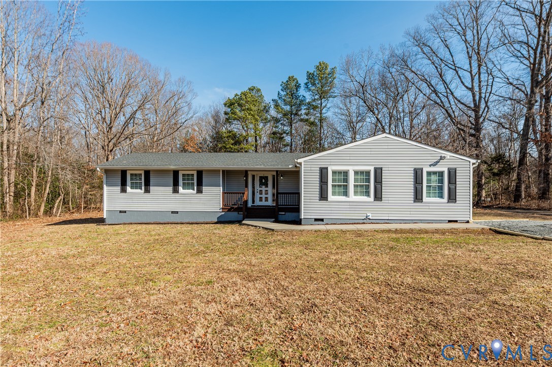 10298 Jamestown Road Ashland, VA 23005 - Photo 2 of 46 a front view of a house with a yard