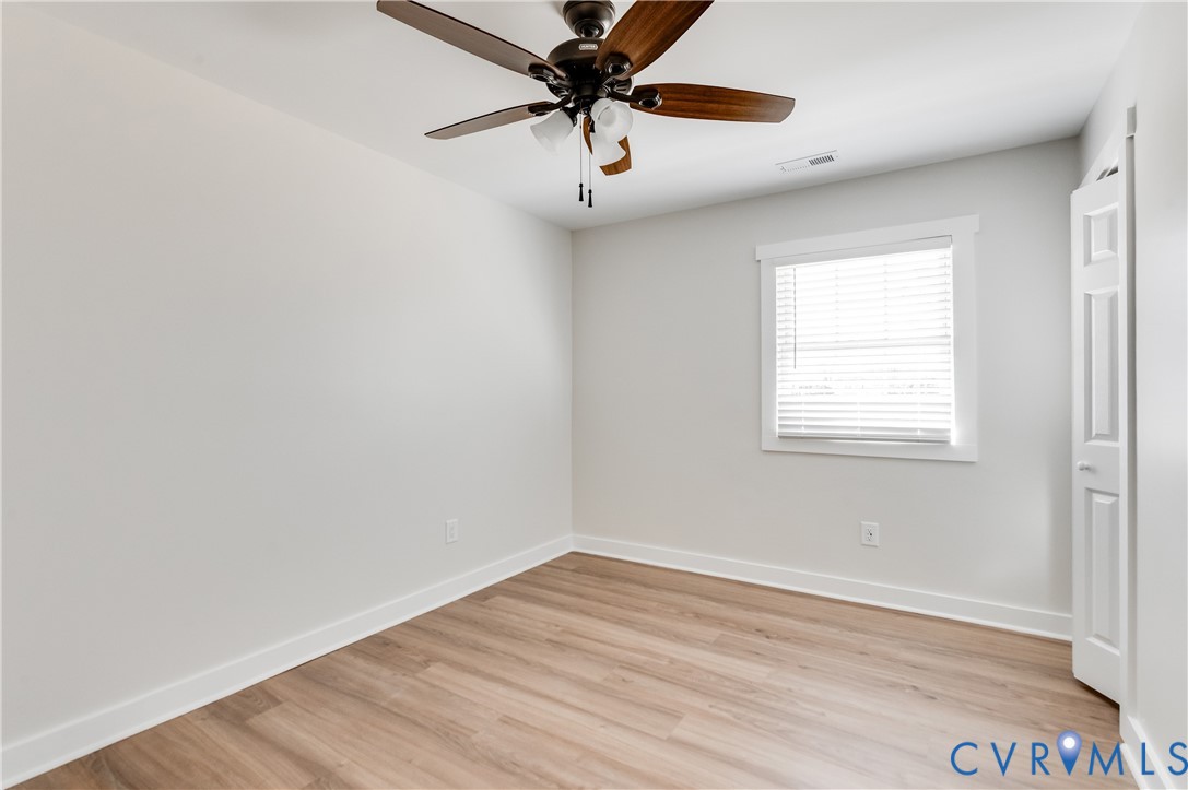 10298 Jamestown Road Ashland, VA 23005 - Photo 28 of 46 wooden floor in an empty room with a window