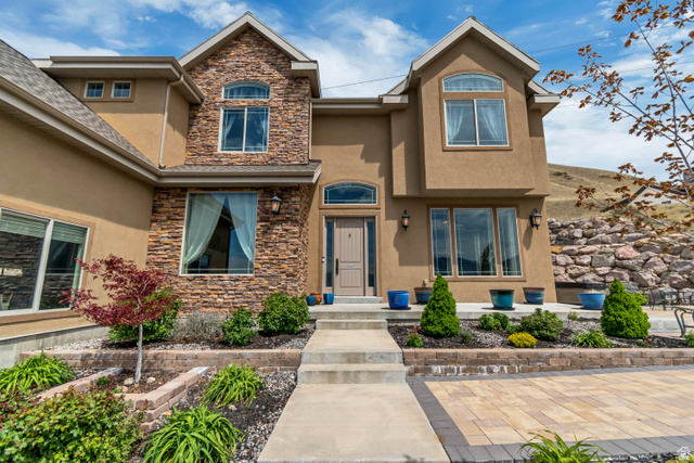 2543 East 700 South Springville, UT 84663 - Photo 9 of 73 Property entrance with stone siding and stucco siding