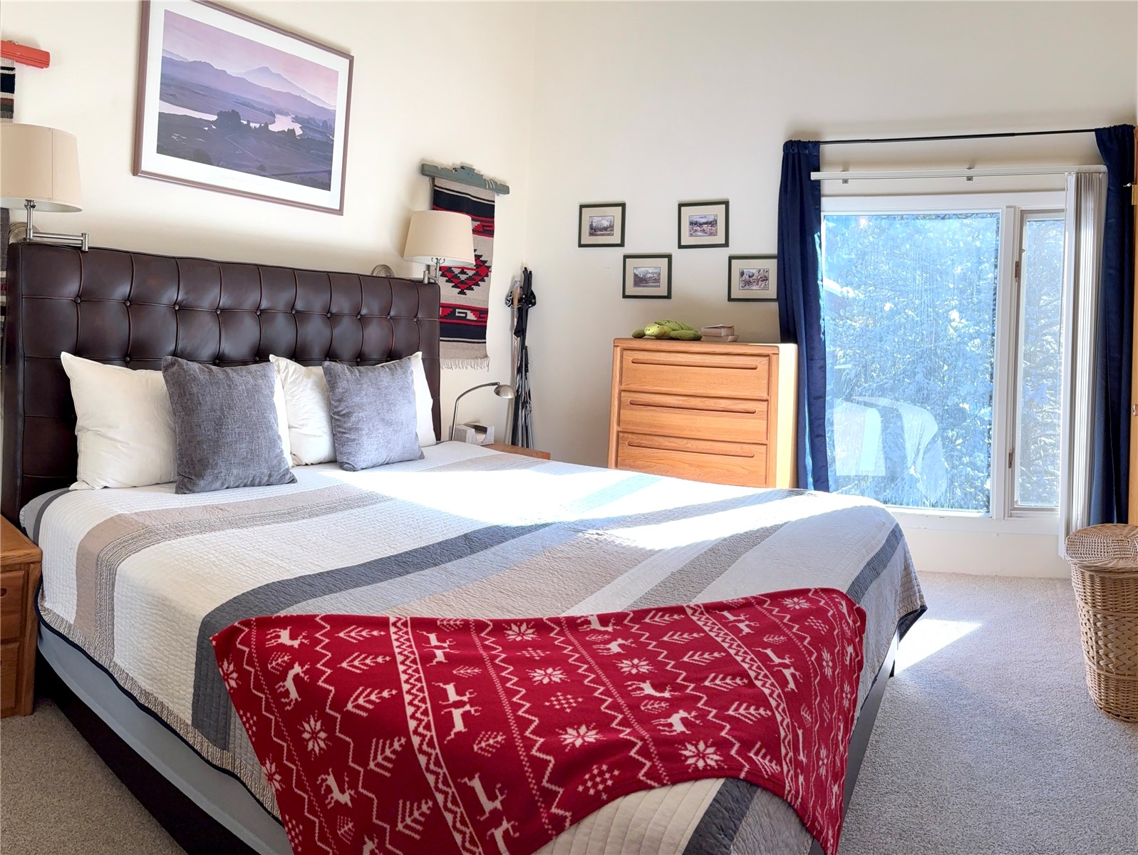 78 Guller Road, Unit 303 Copper Mountain, CO 80443 - Photo 22 of 43 a bedroom with a bed and a painting on the wall