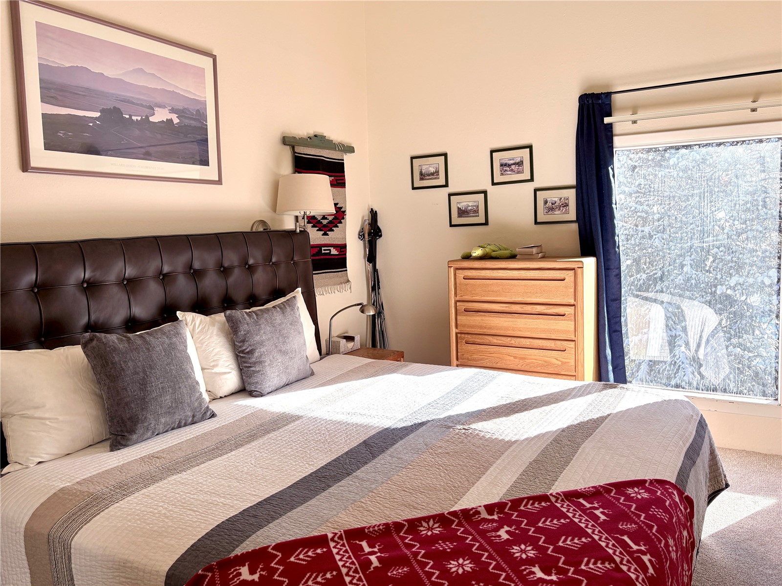 78 Guller Road, Unit 303 Copper Mountain, CO 80443 - Photo 23 of 43 a bedroom with a bed and a painting on the wall