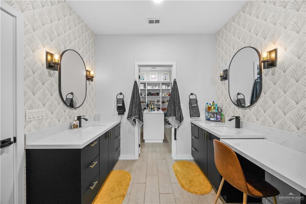 2800 Encke Rd Mission Mission, TX 78574 - Photo 14 of 21 a bathroom with a double vanity sink mirror and tub