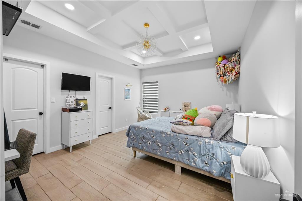 2800 Encke Rd Mission Mission, TX 78574 - Photo 16 of 21 a bedroom with a bed and a television