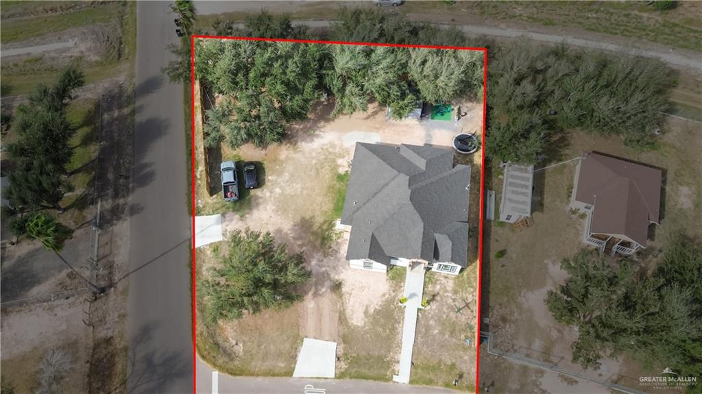 2800 Encke Rd Mission Mission, TX 78574 - Photo 3 of 21 an aerial view of a house with a yard and large trees