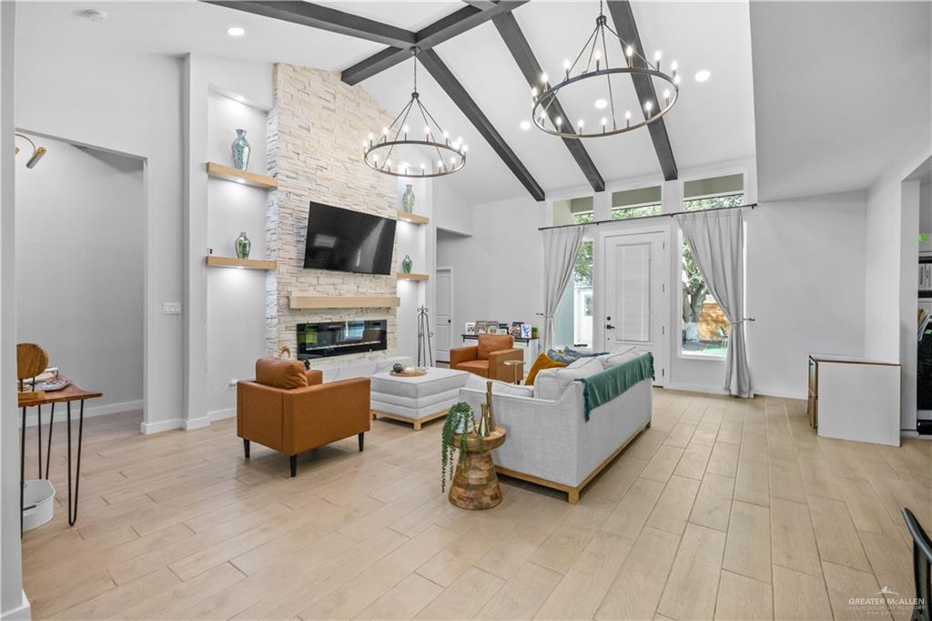 2800 Encke Rd Mission Mission, TX 78574 - Photo 5 of 21 a living room with furniture a flat screen tv and a fireplace