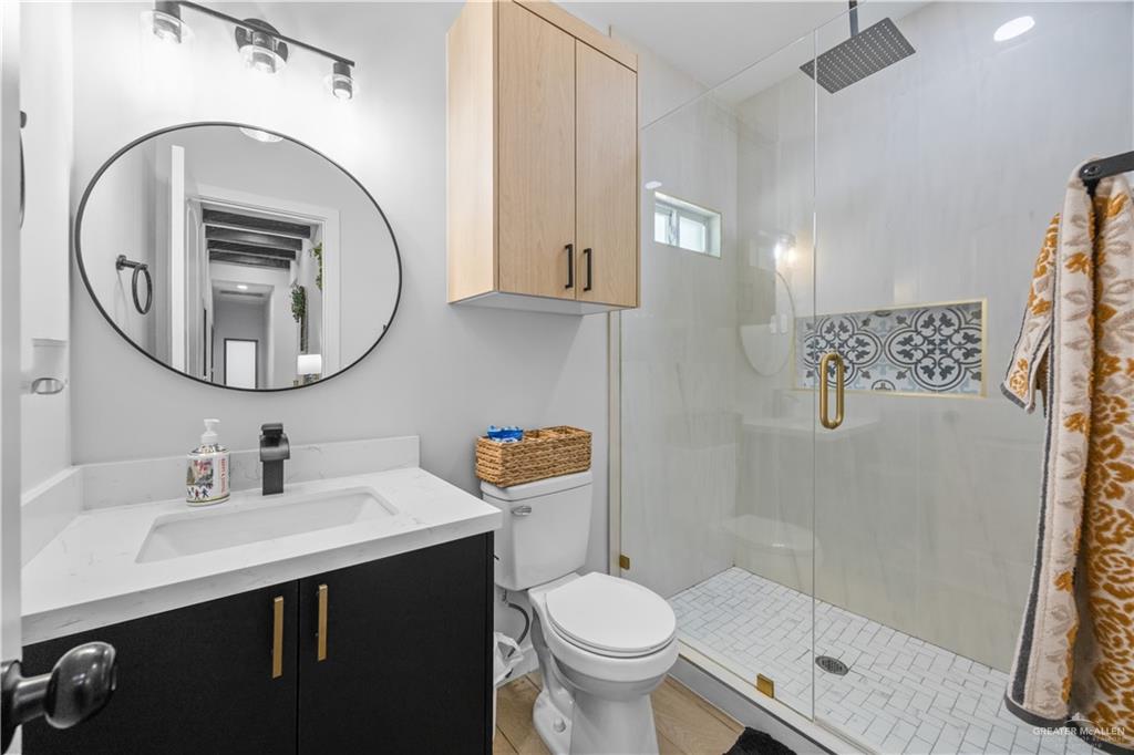 2800 Encke Rd Mission Mission, TX 78574 - Photo 9 of 21 a bathroom with a sink and a mirror