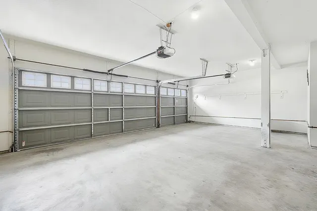 a aerial view of a house with a yard