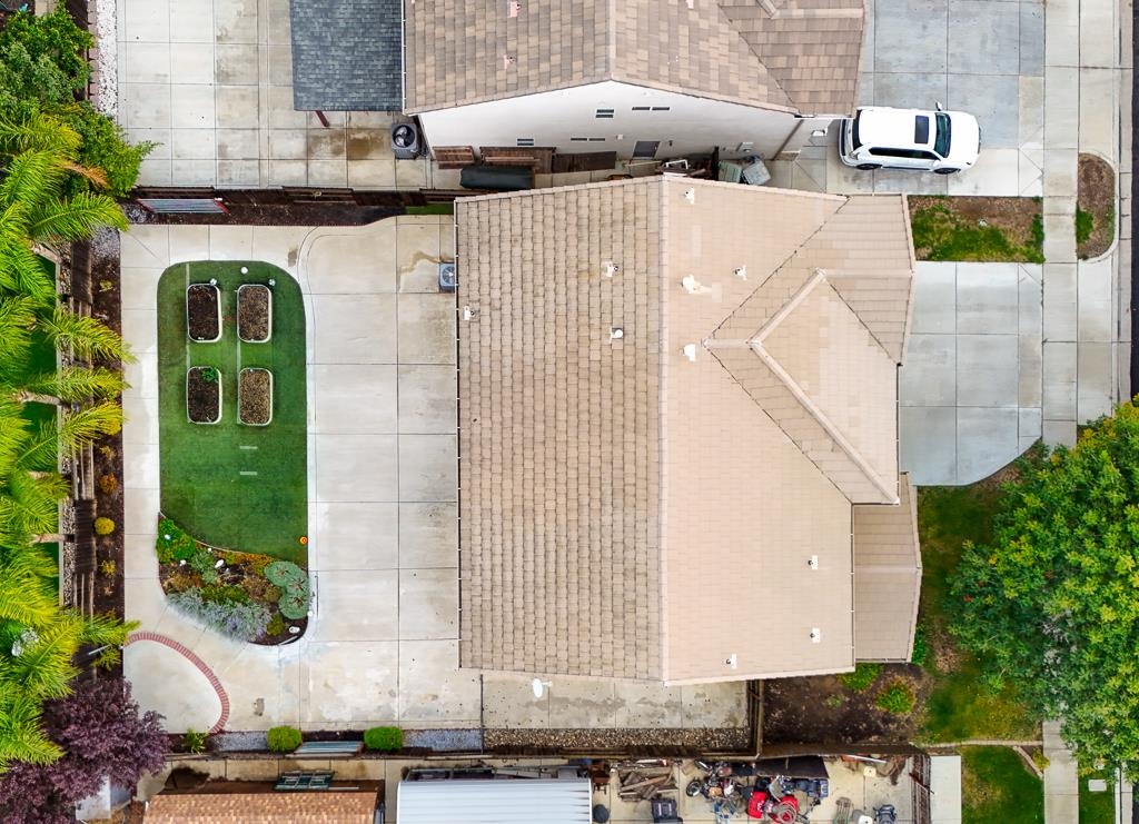 1413 Angus Street Patterson, CA 95363 - Photo 47 of 60 a aerial view of a house with a yard