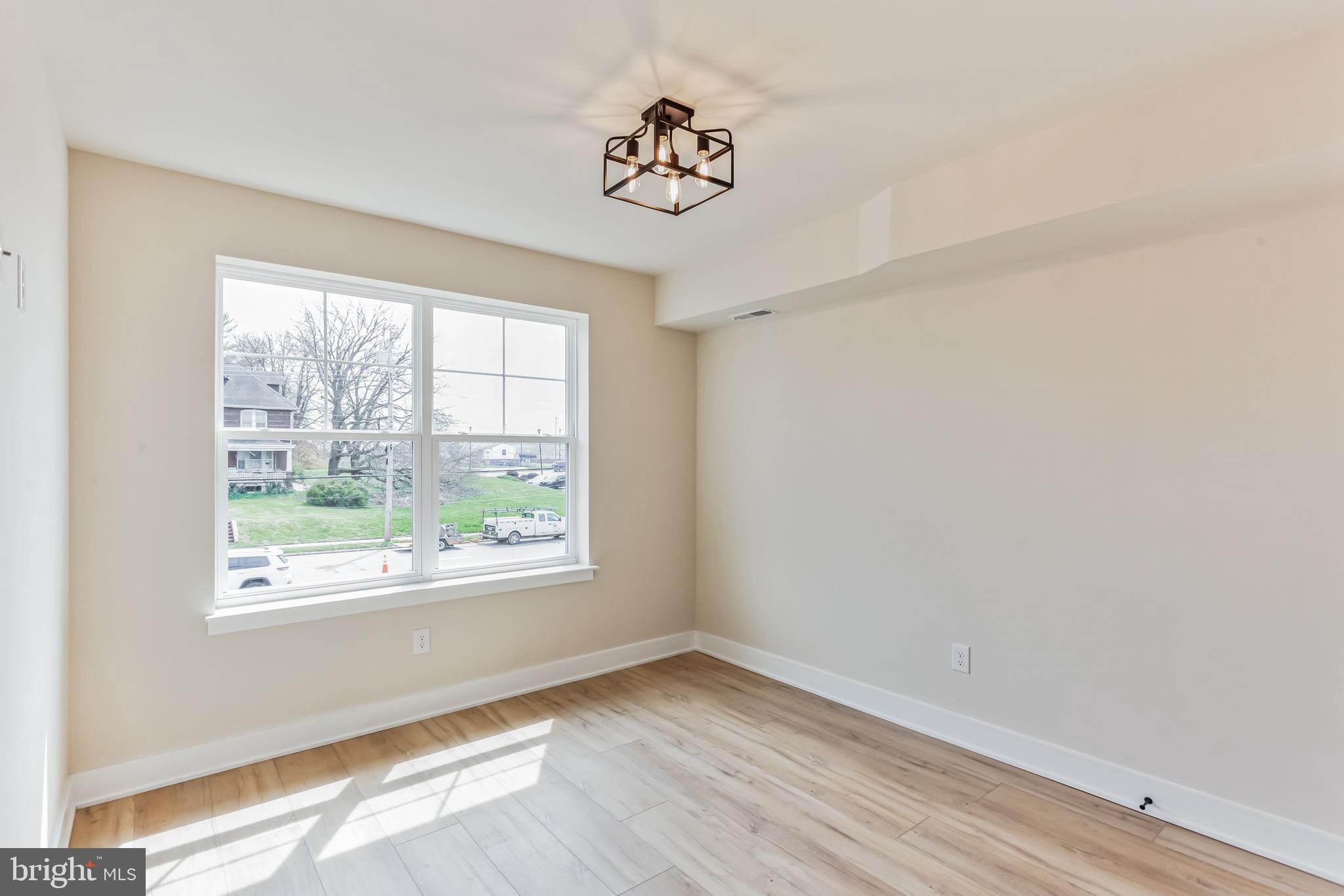 1236 Butler Pike, Unit 2 Conshohocken, PA 19428 - Photo 14 of 15 a view of an empty room with a window