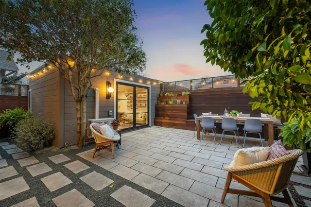 a view of a lounge chairs in the patio