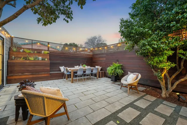 a view of a lounge chairs in a patio
