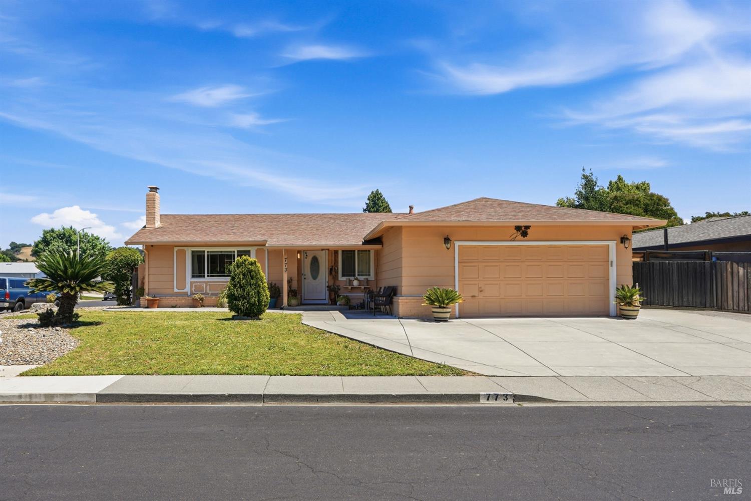 773 Blue Ridge Lane Vacaville, CA 95688 - Photo 1 of 44 a front view of a house with a yard and garage