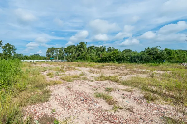 a view of a lake view with houses in back