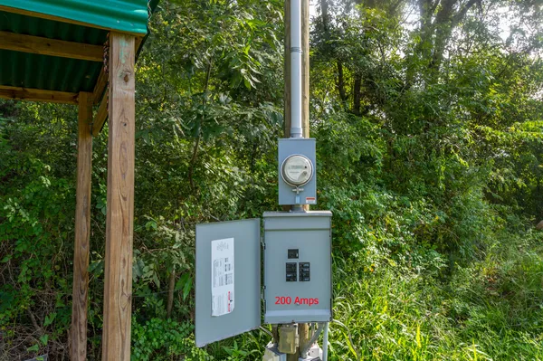 a sign that is on the side of a small yard